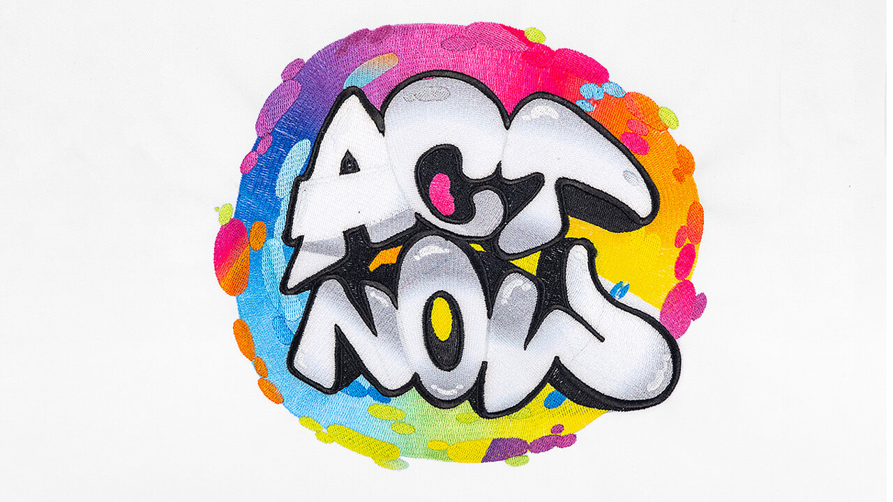 Colorful Act Now embroidery design