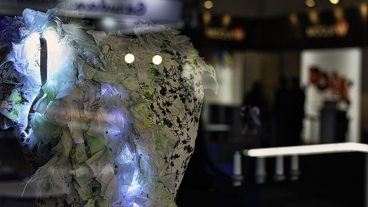 Smart fashion dress with LED lighting and colour sensor