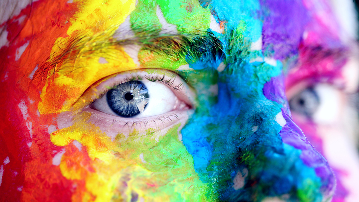 [Translate to Global Portugiesisch:] face body painted with many different colours